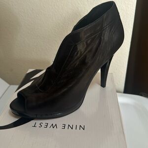 Nine West black Pendanto slip on boots size 10